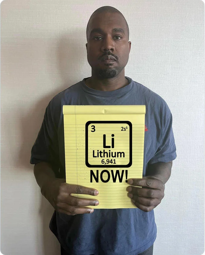 Kanye West Holding Notepad