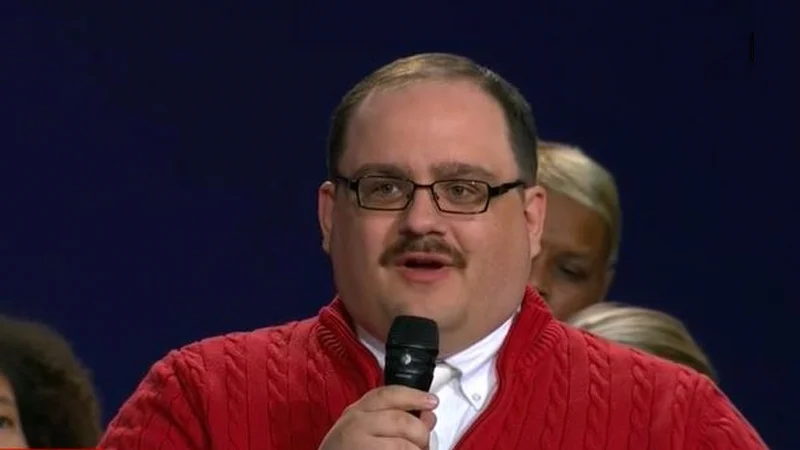 Ken Bone speaking during the second 2016 U.S. presidential town hall debate, wearing the red sweater that made him an instant internet sensation.