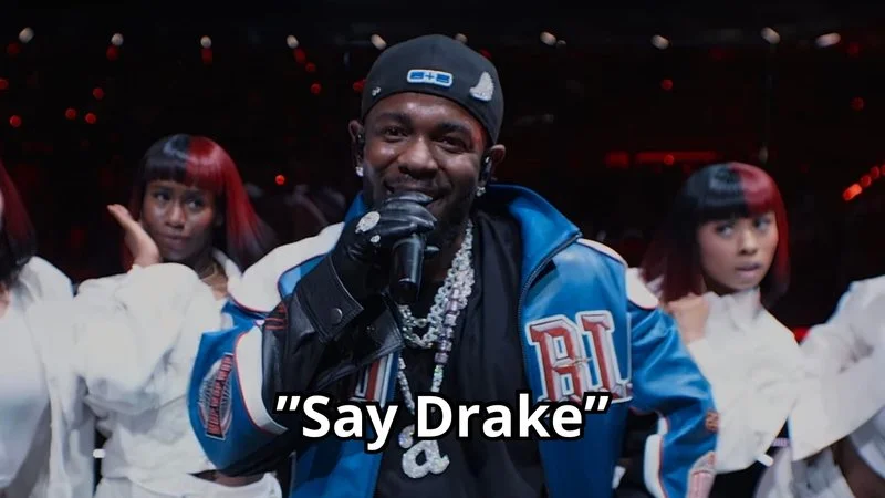 The iconic grinning expression that sparked the viral meme.