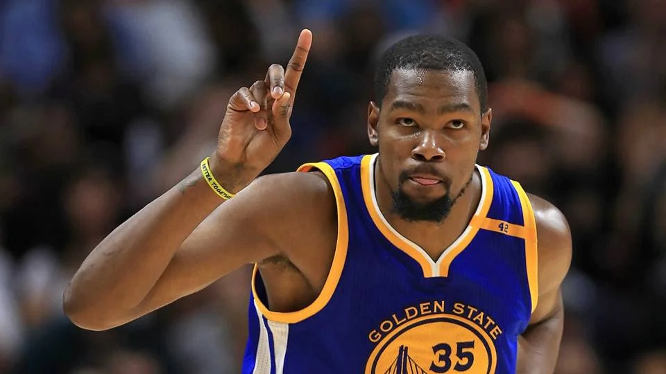 Kevin Durant playing for the Golden State Warriors, wearing his signature #35 jersey.