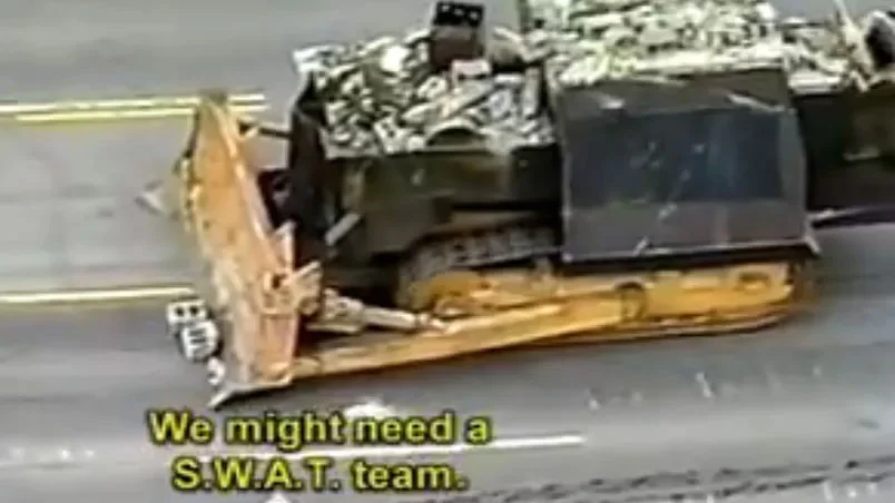 News footage of Marvin Heemeyer's armored Komatsu D355A bulldozer, dubbed the Killdozer, during its June 2004 rampage in Granby, Colorado.