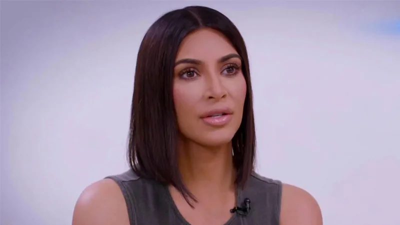 Kim Kardashian pictured during a televised interview.