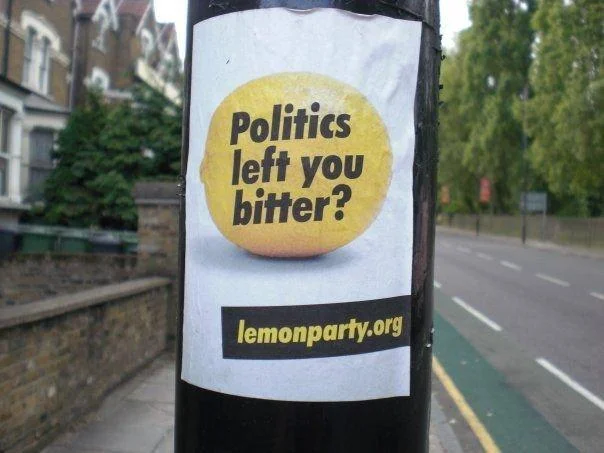 A guerrilla marketing lamppost sticker promoting the lemonparty.org shock site as a fake political party.