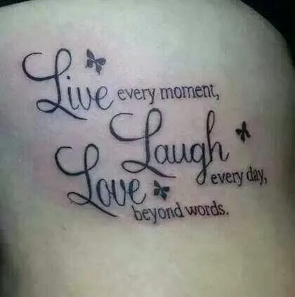 Permanent tattoo version of Live Laugh Love.