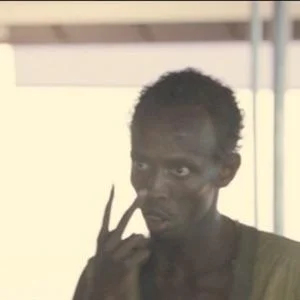 Man displaying a skeptical, disapproving expression conveying judgment