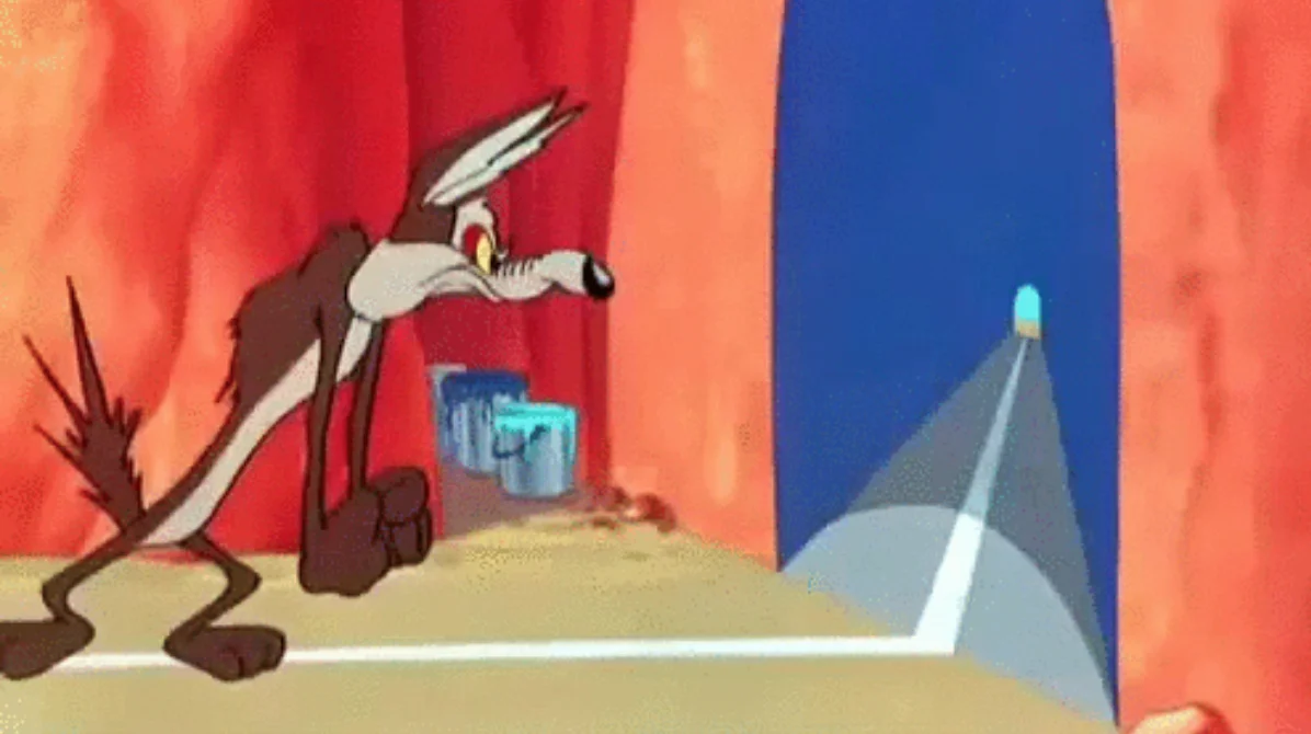 The iconic Looney Tunes gag: Wile E. Coyote paints a fake tunnel on a solid rock wall in hopes of tricking the Road Runner.
