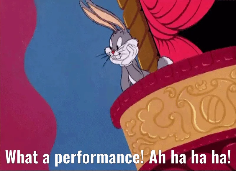Bugs Bunny reacting from the theater balcony — 'What a performance! Ah ha ha ha!'