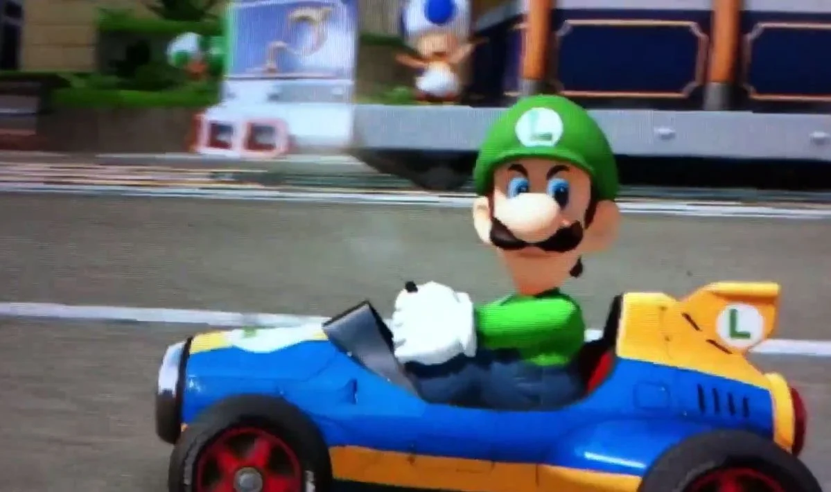 The iconic Mario Kart 8 screenshot of Luigi's cold, sideways glare that spawned the 'Luigi Death Stare' meme in 2014.