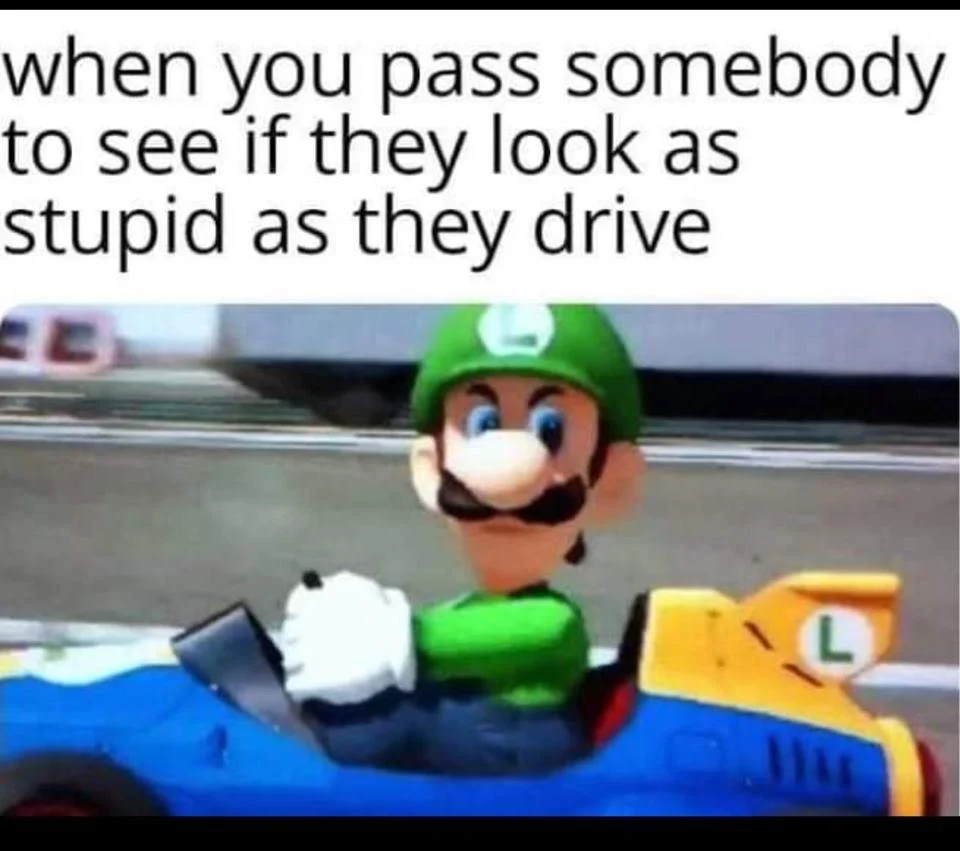A popular Luigi Death Stare meme captioned about judging fellow drivers as you pass them.