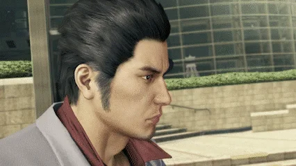 Kiryu watchful in Kamurocho streets.