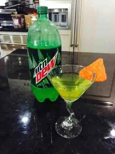 A cocktail styled with Mountain Dew and a Dorito garnish, nodding to the meme's staple 'MLG snack' pairing.