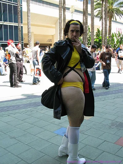 The definitive Man-Faye: cosplayer Frank DeCaro (aka Man-Faye) in the iconic gender-swapped Faye Valentine outfit at Anime Expo.