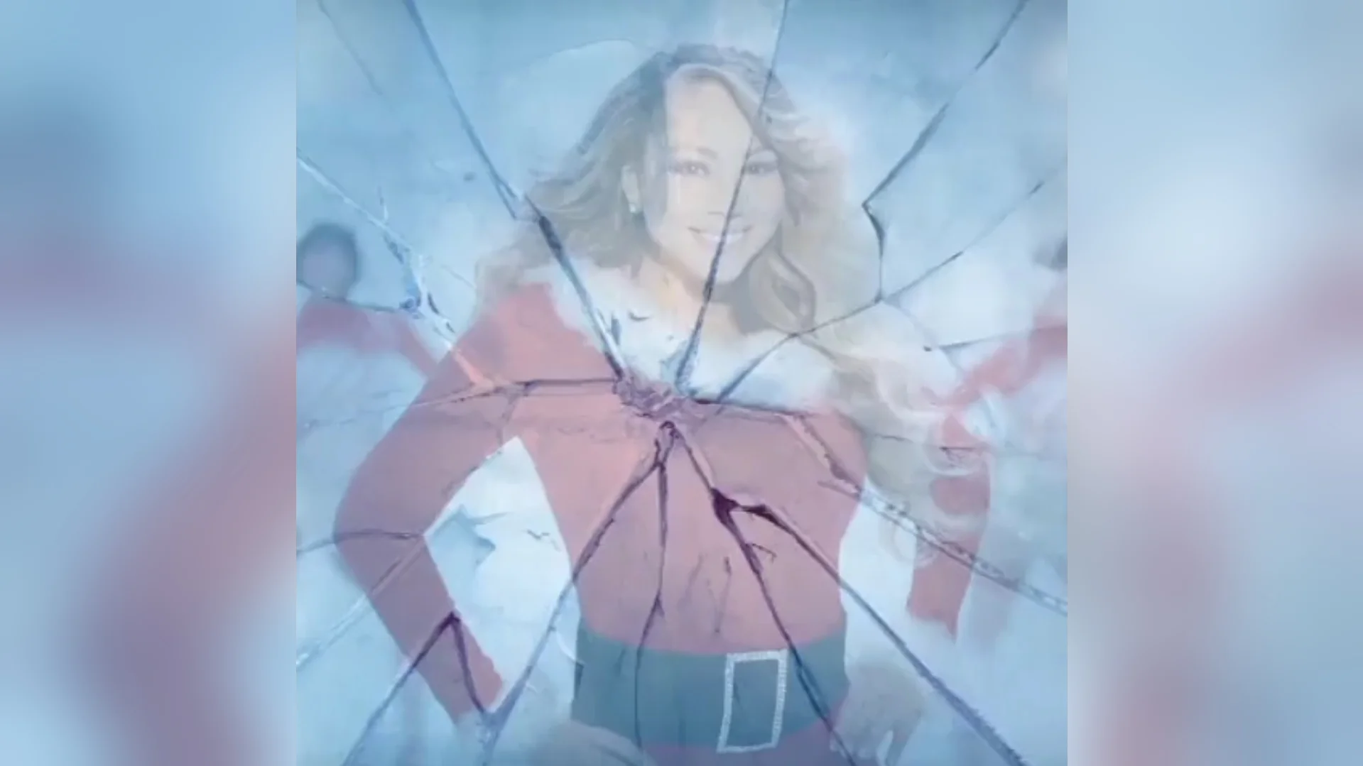 The cover image for the 'Mariah Carey Defrosting' meme, showing the singer in Santa attire behind a frosted, cracking surface as if emerging from ice.