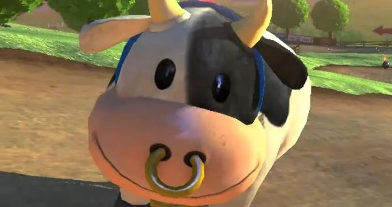 The iconic Moo Moo Meadows cow as seen on the course preview screen in Mario Kart Wii, the central image of the meme.