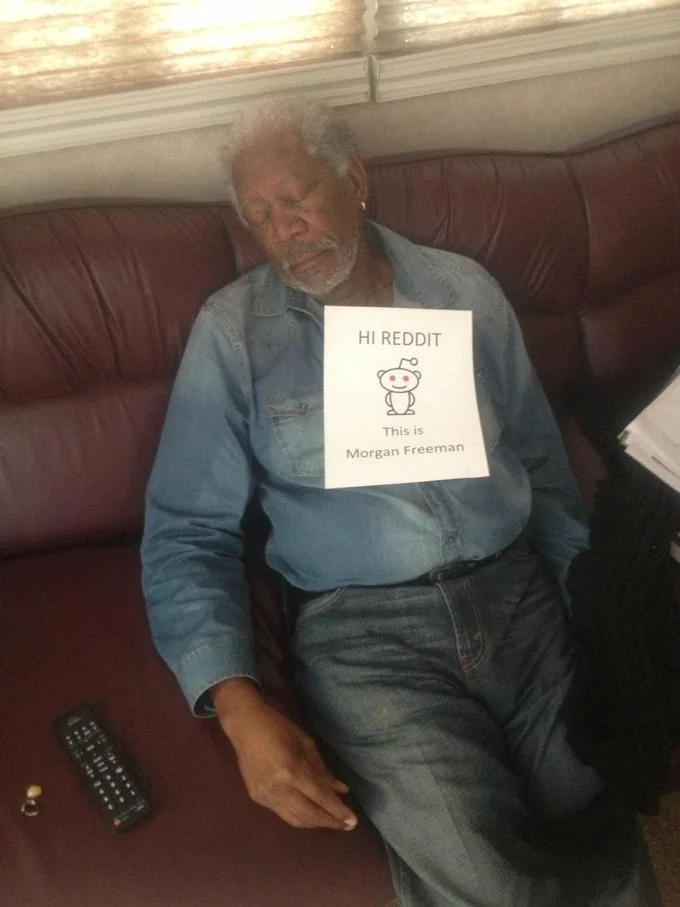 The infamous 'sleeping' Reddit AMA verification photo of Morgan Freeman that sparked debate over its authenticity.