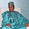 Man in traditional Nigerian formal attire.