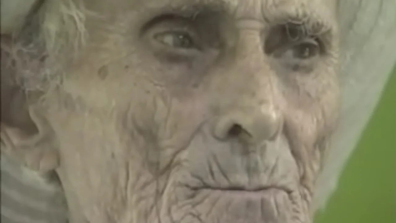 The iconic close-up frame of Nimrod Workman from his 'Oh Death' performance that became the meme's primary reference image.