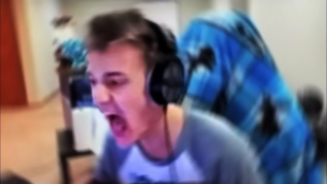 Streamer Tyler 'Ninja' Blevins raging during a livestream, the archetypal image paired with his infamous 'it's just a game' tweet.
