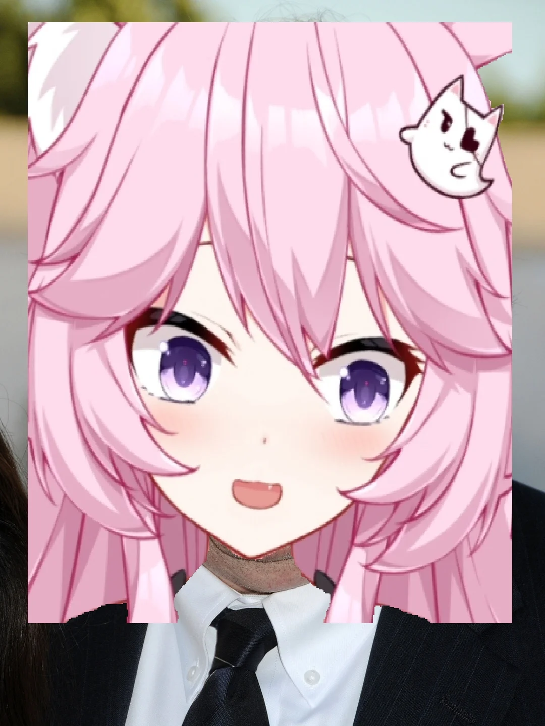 A meme edit placing the Nyanners VTuber face over a person in a business suit, contrasting her cute persona with a formal setting.