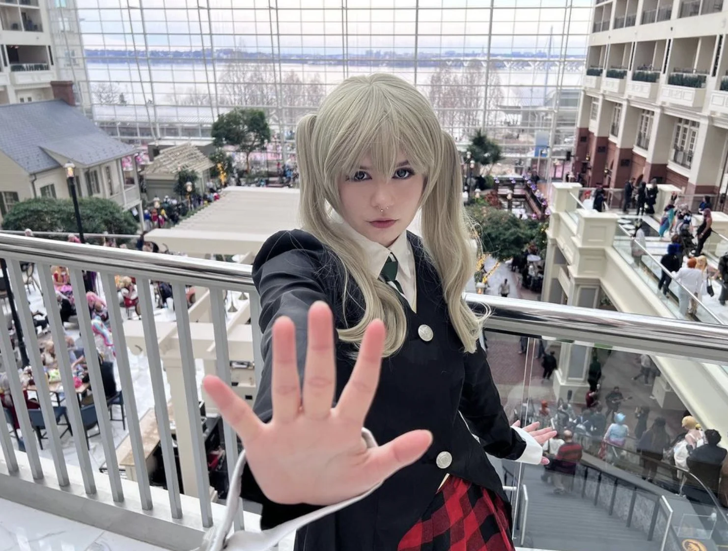 NyanNyanCosplay in a different cosplay at a convention appearance.