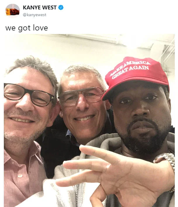 Kanye West 'we got love' ok hand gesture post.