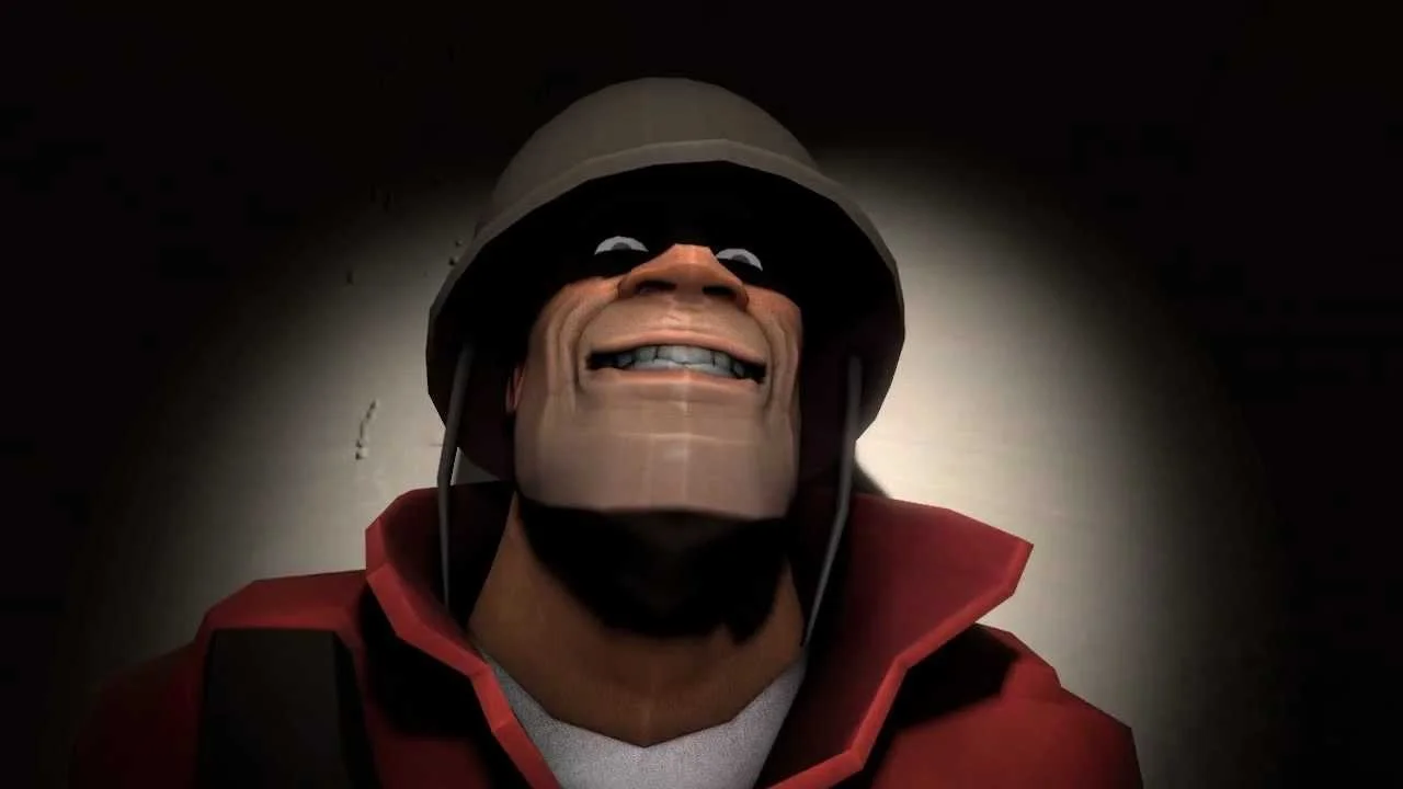 The iconic Painis Cupcake still: TF2's Soldier grinning menacingly, taken from RubberFruit's original SFM shorts.