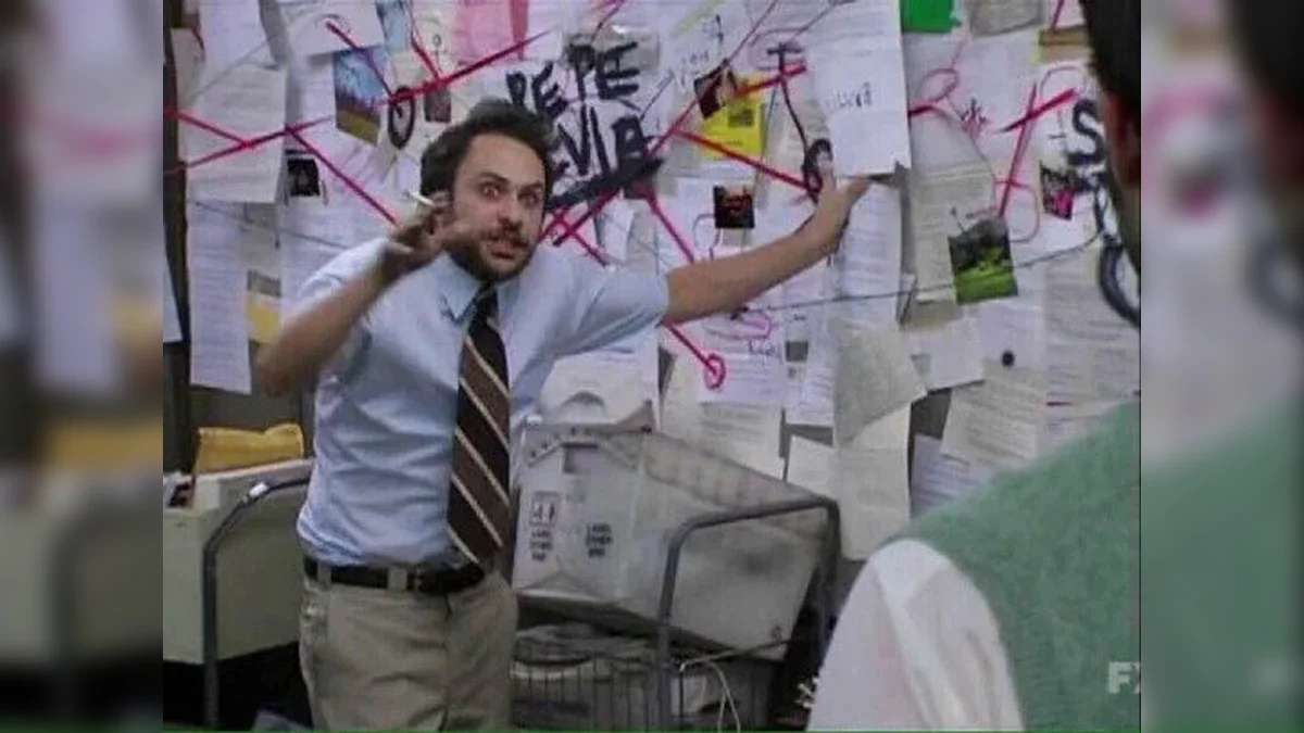 The iconic scene from 'Sweet Dee Has a Heart Attack' (Season 4, Episode 10) where Charlie explains his mail room conspiracy theory.