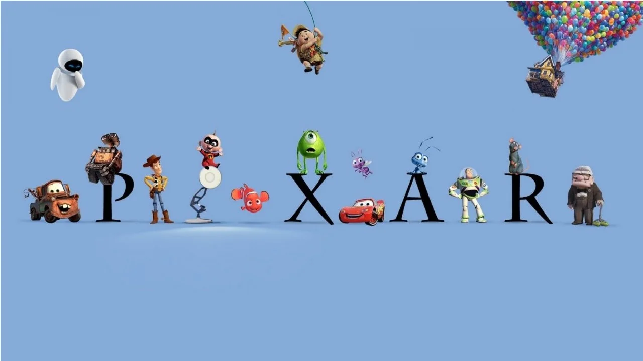 A promotional lineup featuring iconic Pixar characters arranged with the studio's name, showcasing decades of Pixar Animation Studios releases.