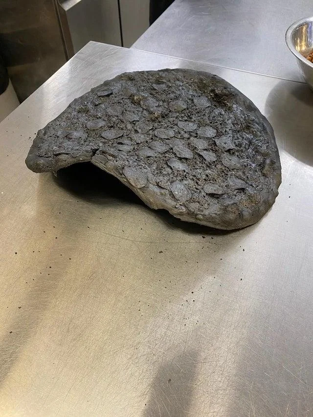 A catastrophic pizza cooking disaster.