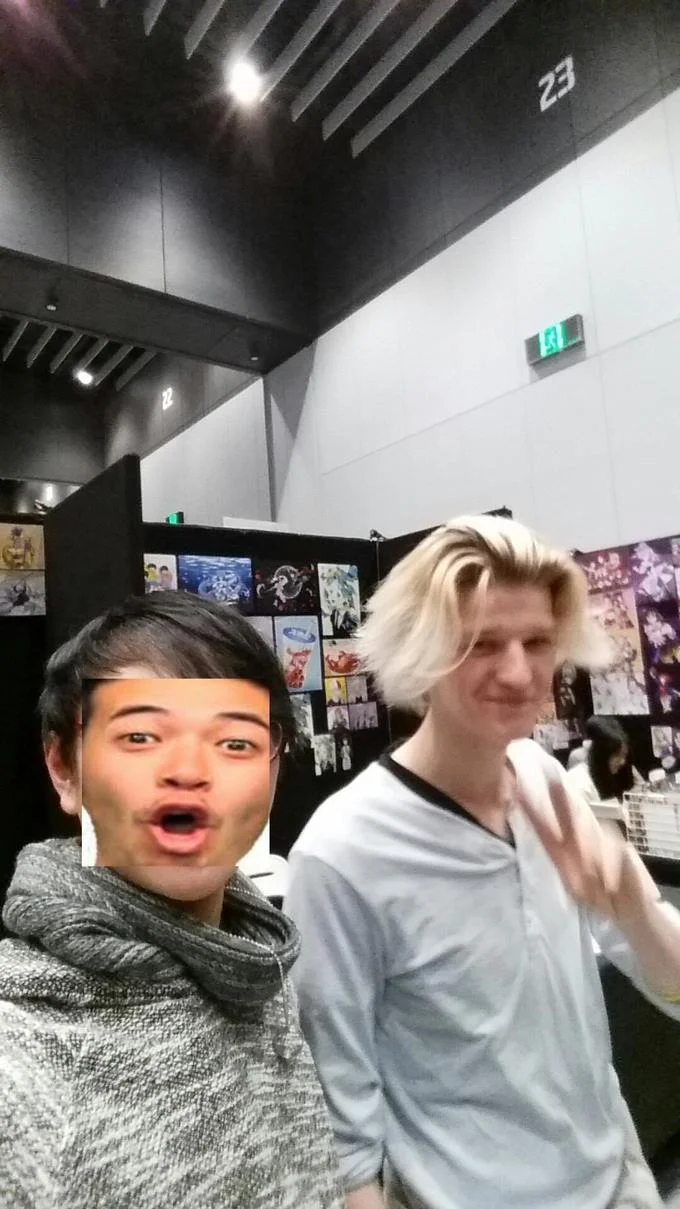 A photo edit placing the Pogu face over a person at a convention, a common style of Pogu image macro.