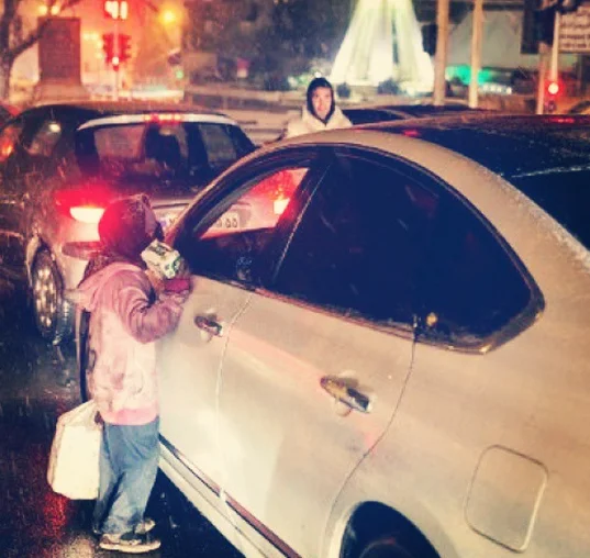 Child labor in harsh weather conditions.