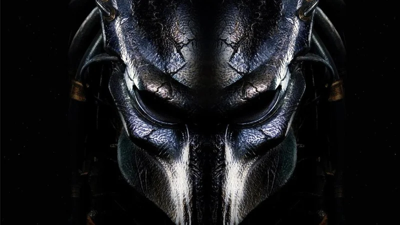 The Predator's signature bio-mask, the visual icon of the film franchise and the entry's key image.