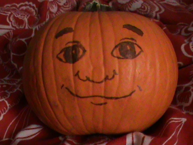 A hand-drawn tribute turning an actual pumpkin into the Pumkin character with just a marker.