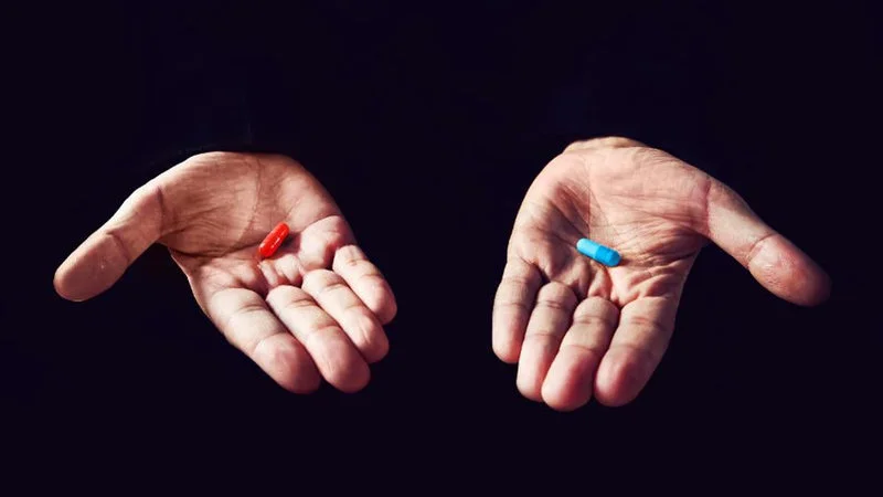 The iconic Matrix scene of choosing between red and blue pills.