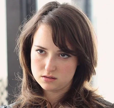 The iconic portrait commonly used to illustrate the resting bitch face phenomenon, showing a neutral expression that reads as displeased.