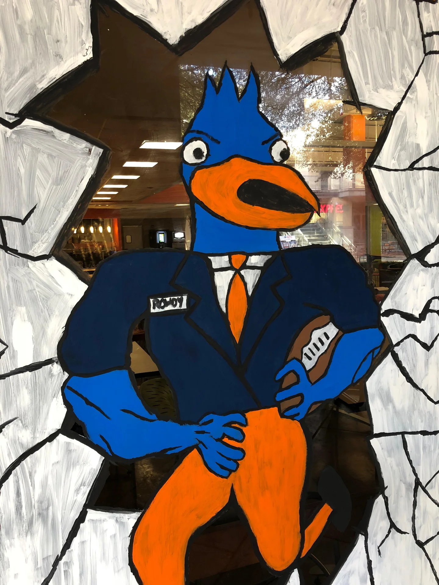 The original 'Retarded Rowdy' window mural depicting UTSA's Rowdy the Roadrunner mascot, whose crude, off-model style made it an instant online sensation.