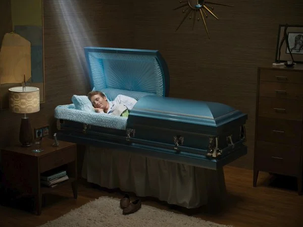 A stylized funeral photo sometimes shared in 'RIP in Peace' meme threads for visual effect.