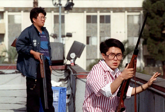 Most recognized photograph of armed women during 1992 Roof Koreans event.