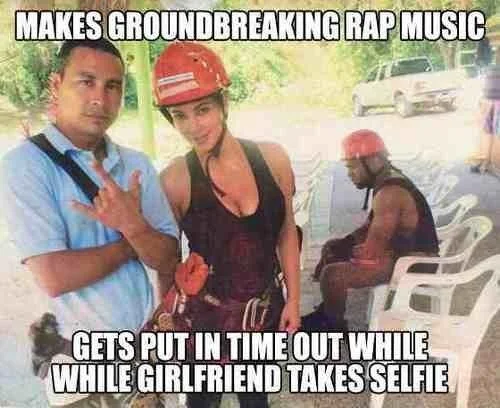 An Impact-font image macro using the original Sad Kanye photo to joke about the contrast between his musical achievements and being sidelined during the couple's photo op.