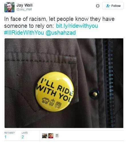 A tweet linking the safety pin movement to the earlier #IllRideWithYou solidarity campaign, another effort to signal allyship against racism.