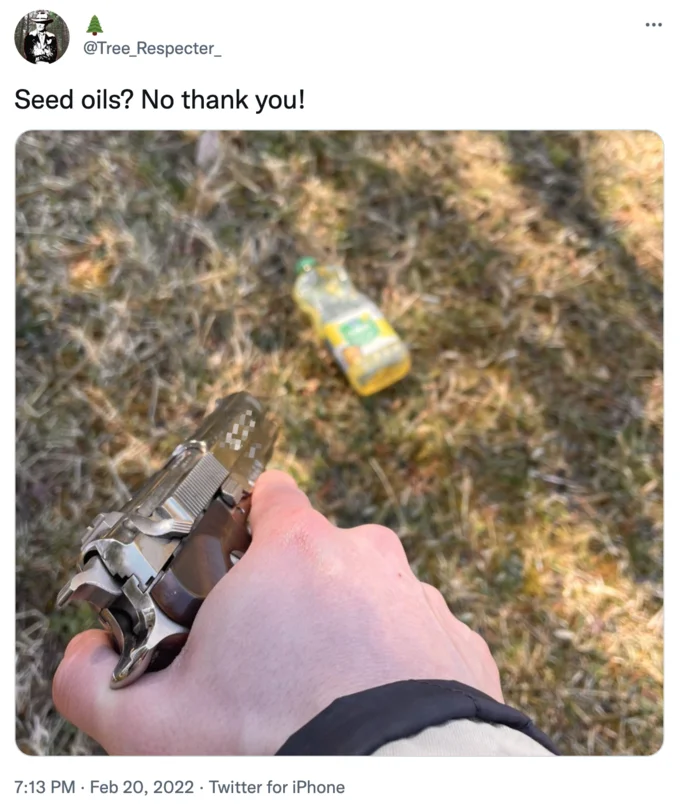 A tweet dramatizing anti-seed-oil sentiment by showing a revolver aimed at a bottle of cooking oil in the grass.