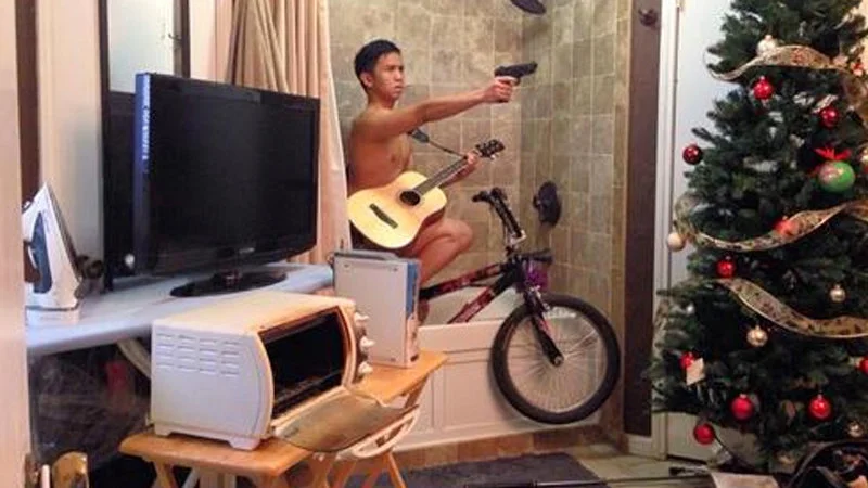Classic Selfie Olympics bathroom mirror pose.