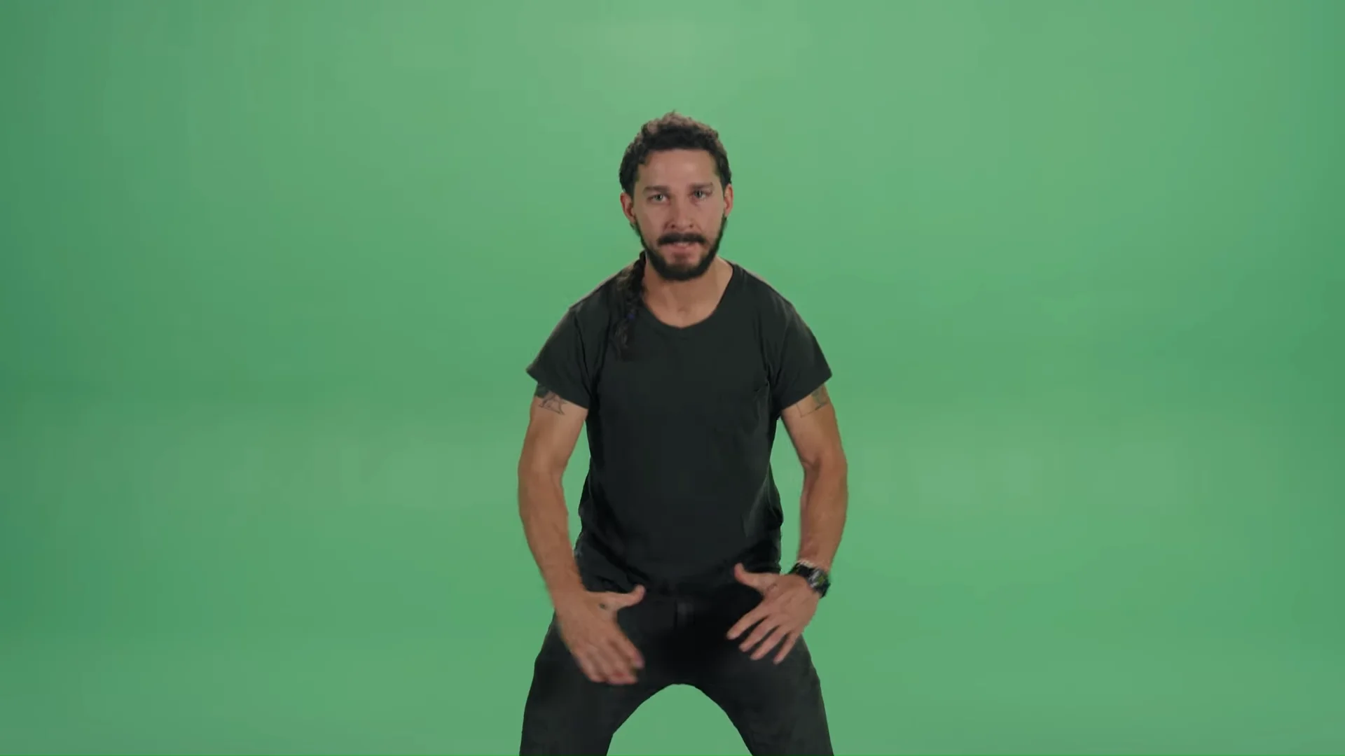 Screenshot from Shia LaBeouf's 2015 'Just Do It' motivational speech video, filmed against a green screen for the LaBeouf, Rönkkö & Turner art project.