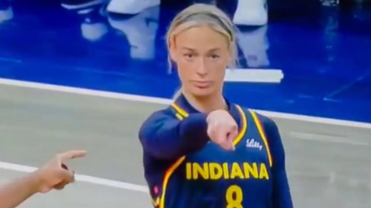 The original broadcast still of Indiana Fever guard Sophie Cunningham pointing back at a referee, which became the basis for the viral meme.