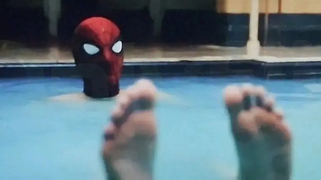 The now-infamous pool scene from the Spider-Man: Brand New Day trailer, featuring Spidey's mask alongside prominently displayed feet.