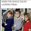 Low-quality squad image with partial text.