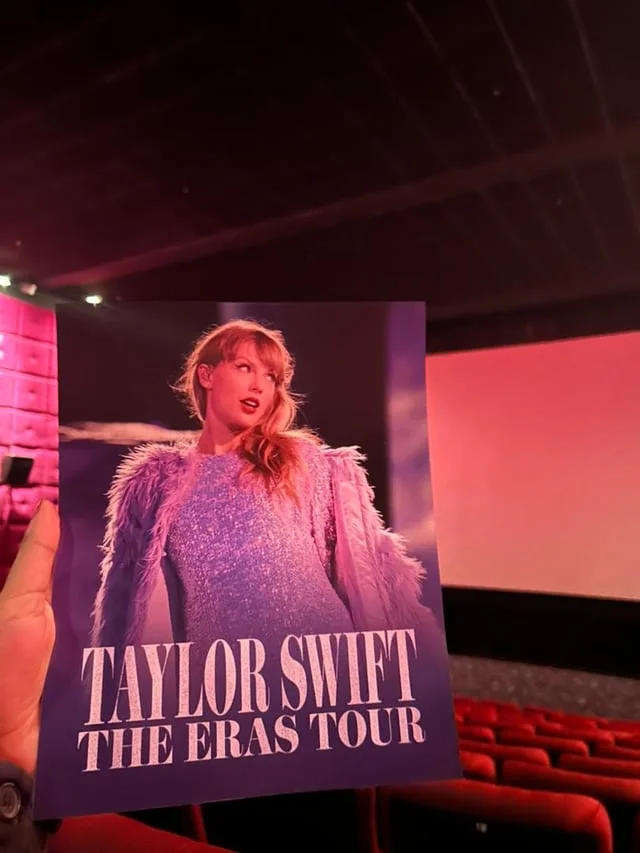 Concert film program at movie theater.