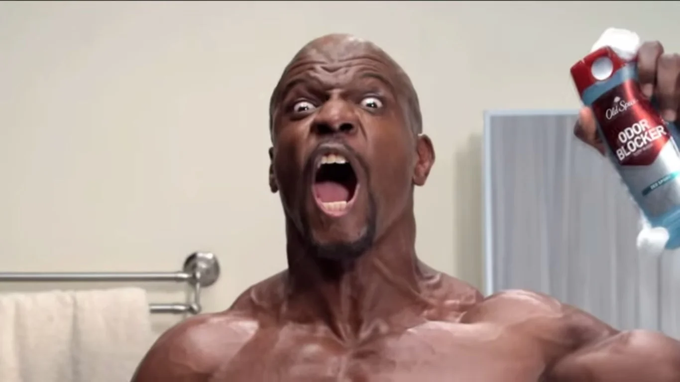 A high-resolution frame of Terry Crews shouting in the Old Spice "Odor Blocker" commercial that fueled the meme.