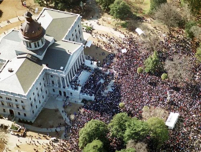 Thousands rally at the South Carolina State House during a demonstration over the Confederate flag.