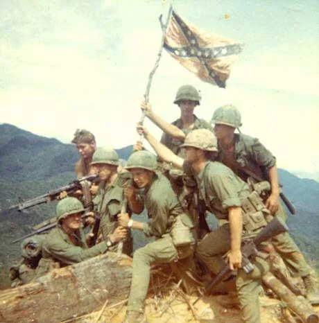 American soldiers raising a Confederate flag during the Vietnam War, a historical image surfaced in discussions of the flag's wartime use.